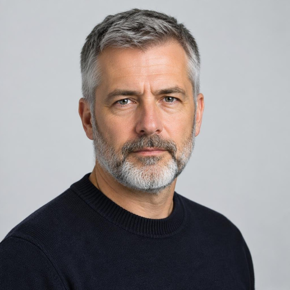 Studio portrait of a senior Belgian male data researcher