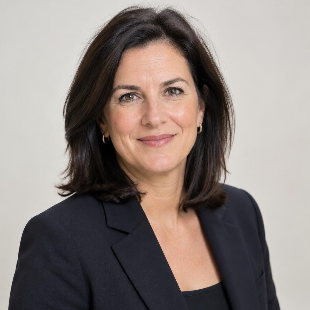Studio portrait of the editor-in-chief, a Belgian woman in her forties